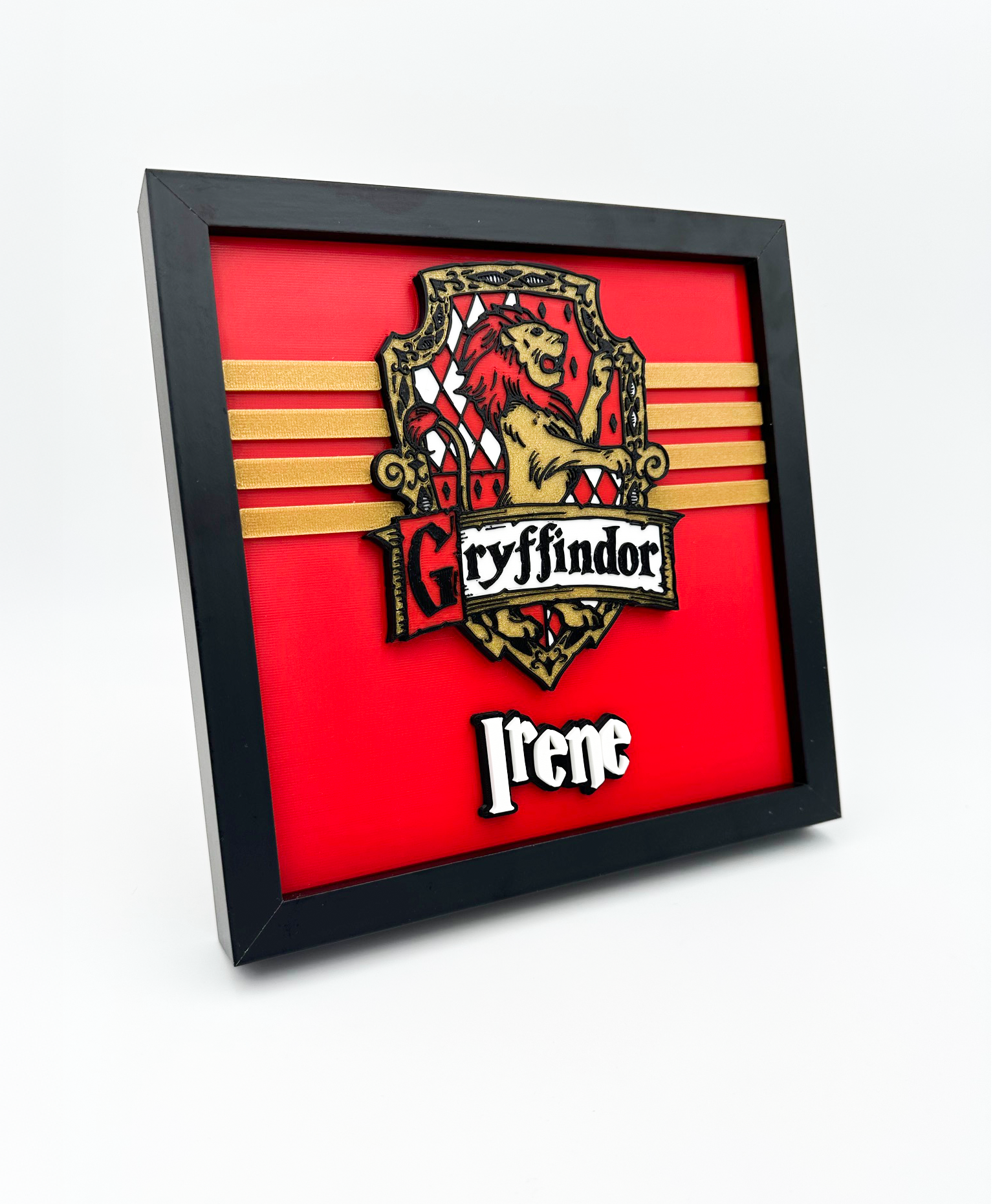 Cuadro Gryffindor impreso en 3D con relieve rojo y dorado vista de perfil