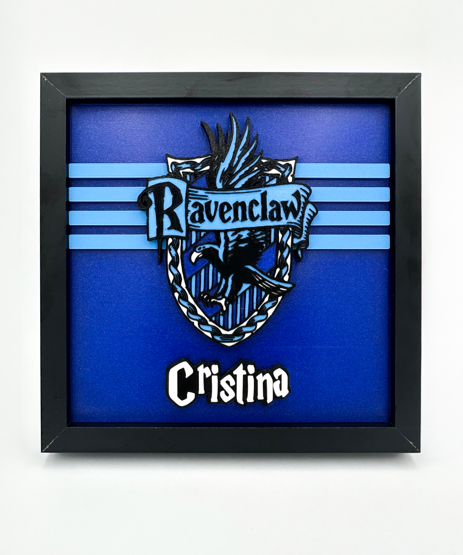 Cuadro Ravenclaw impreso en 3D con colores azul y bronce, ideal para fans